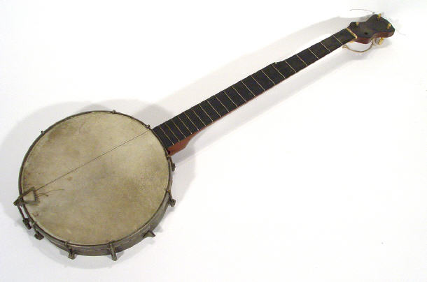 Appraisal: Cased banjo with bone keys and mahogany neck