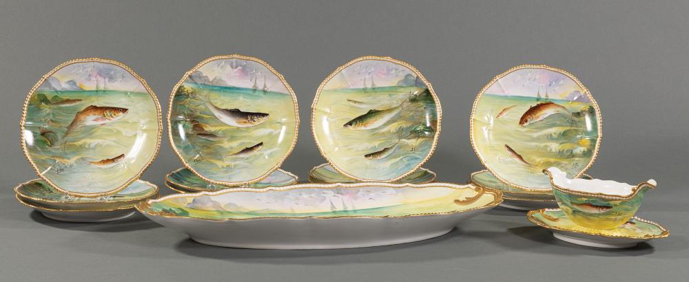 Appraisal: Limoges Polychrome and Gilt Porcelain Fish Service th c marked