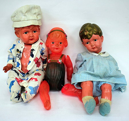 Appraisal: A GROUP OF THREE MID TH CENTURY PLASTIC MOULDED DOLLS