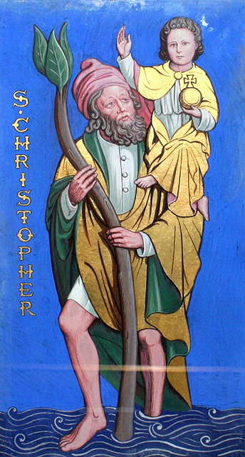 Appraisal: A WOODEN PANEL painted with St Christopher carrying the Christ