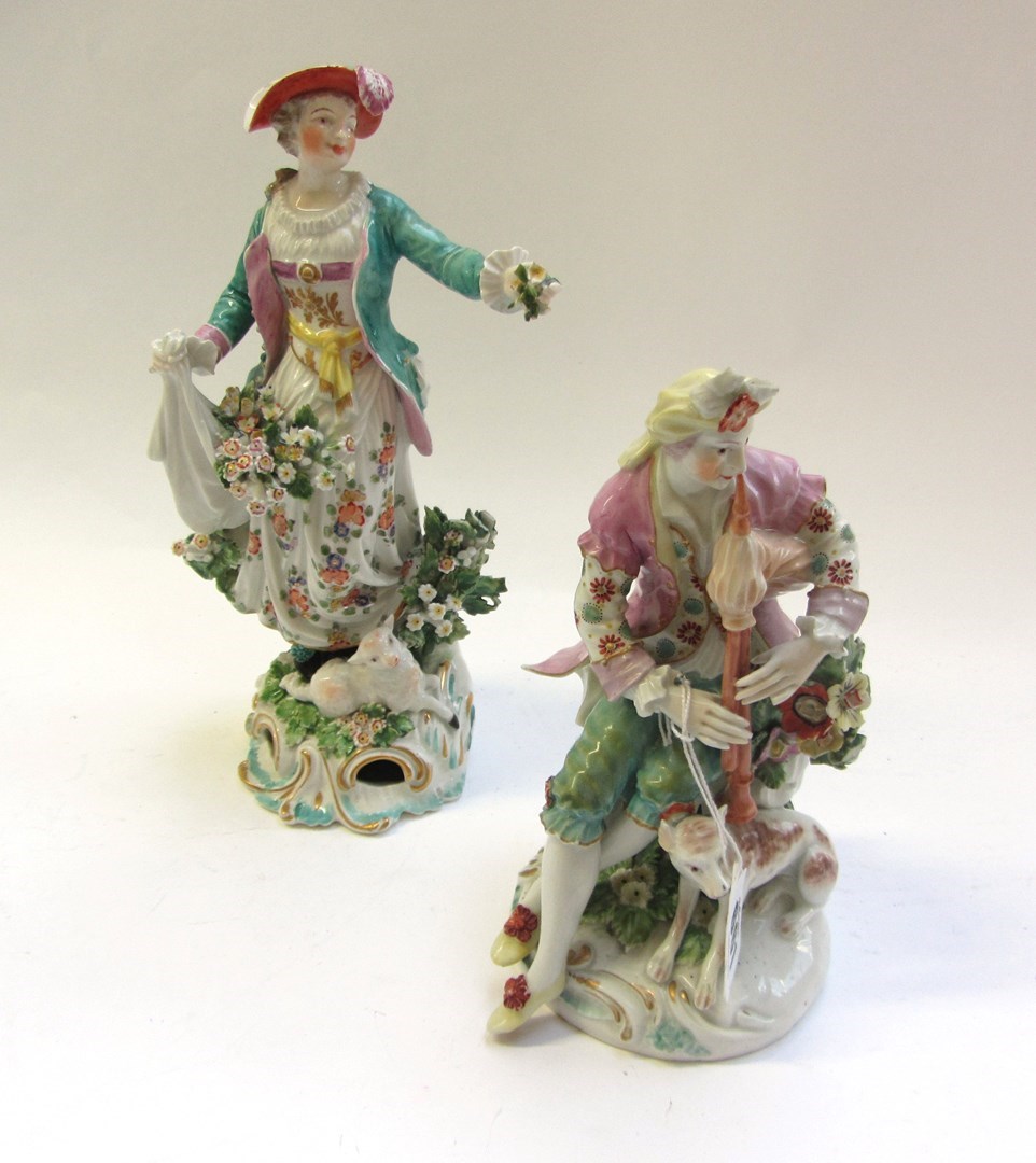 Appraisal: Two Derby figures of a shepherd and a shepherdess circa