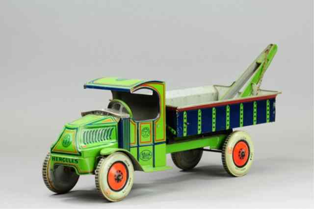 Appraisal: CHEIN HERCULES WRECKER Lithographed tin done in green body blue