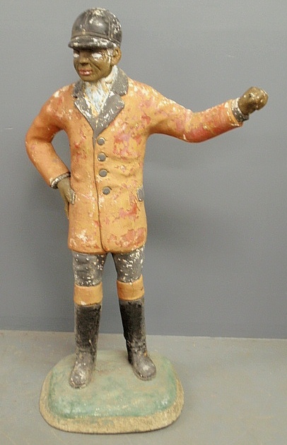 Appraisal: - Cast stone lawn jockey h x w x d