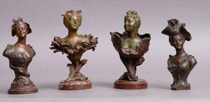 Appraisal: H GODET FEMALE BUSTS EMERGING FROM FLOWERS A PAIR Bronzes