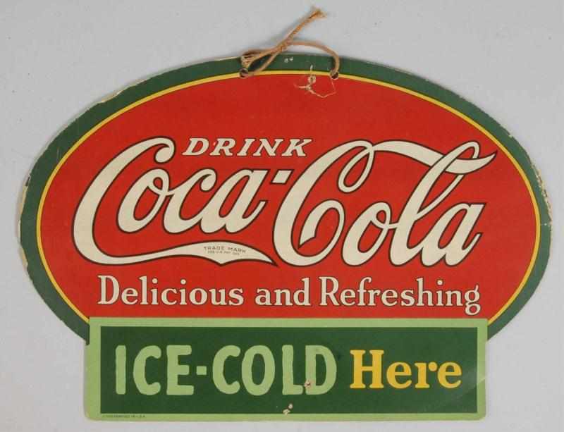 Appraisal: Cardboard Coca-Cola -Sided Cutout Sign Description s Retains original string