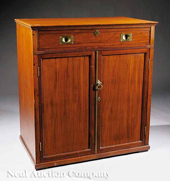 Appraisal: An Edwardian Mahogany Campaign Desk c with fitted desk drawer