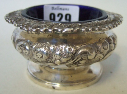 Appraisal: A George IV silver shaped circular salt with floral and