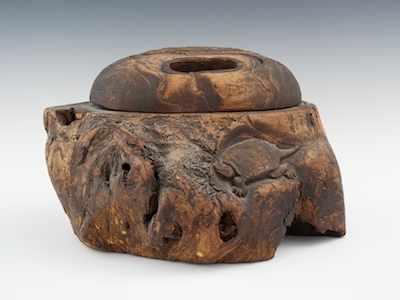 Appraisal: A Large Japanese Carved Rootwood Hibachi Meiji The naturally convoluted