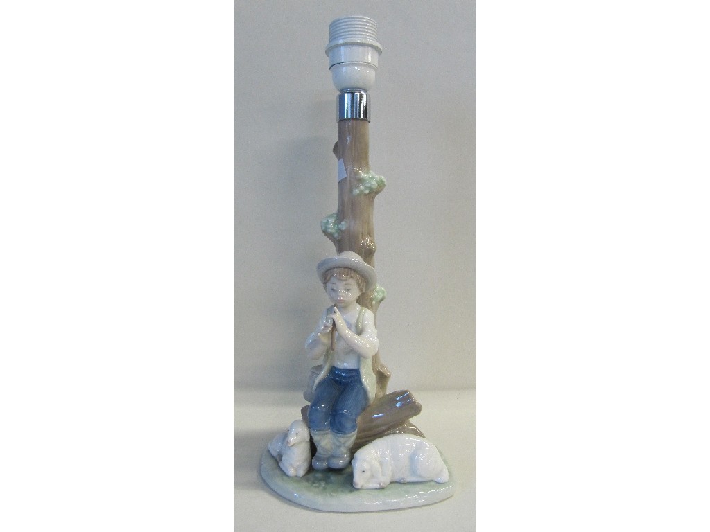 Appraisal: Nao lamp base modelled as a shepherd and sheep