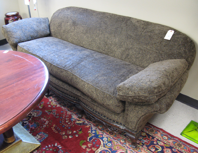 Appraisal: AN OVERSTUFFED SOFA American c 's having dark green upholstery