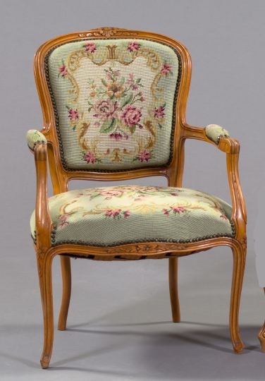 Appraisal: Louis XV-Style Fruitwood and Needlepoint Bergere early th century the