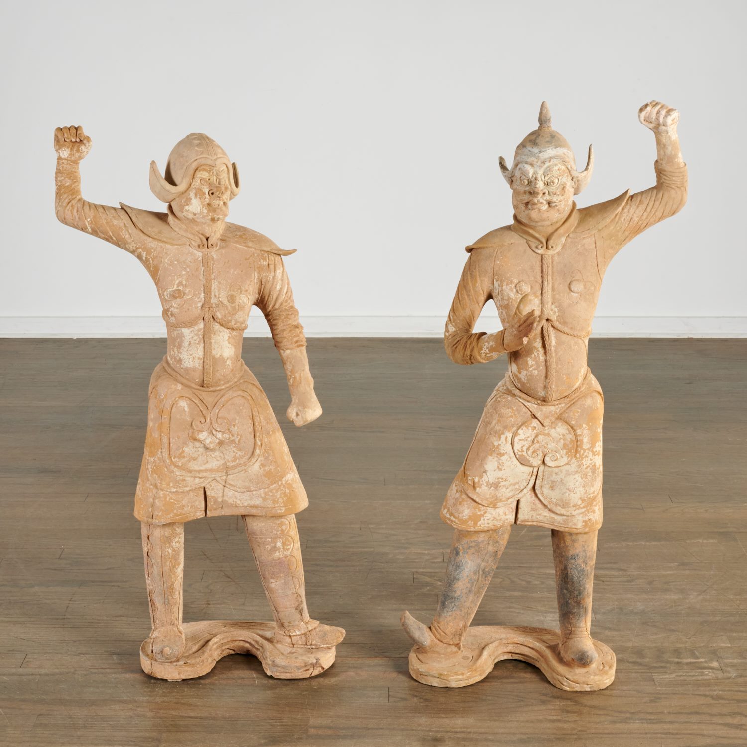 Appraisal: PAIR LARGE CHINESE POTTERY GUARDIAN FIGURES Possibly Han Dynasty BCE-