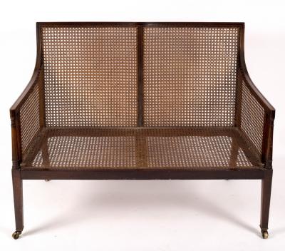 Appraisal: A Regency style berg re two-seat sofa with cane back