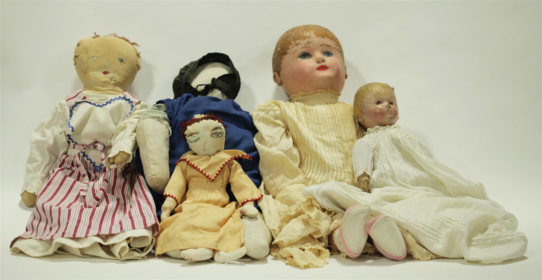 Appraisal: FIVE DOLLS THREE CLOTH TWO COMPOSITION American early th century