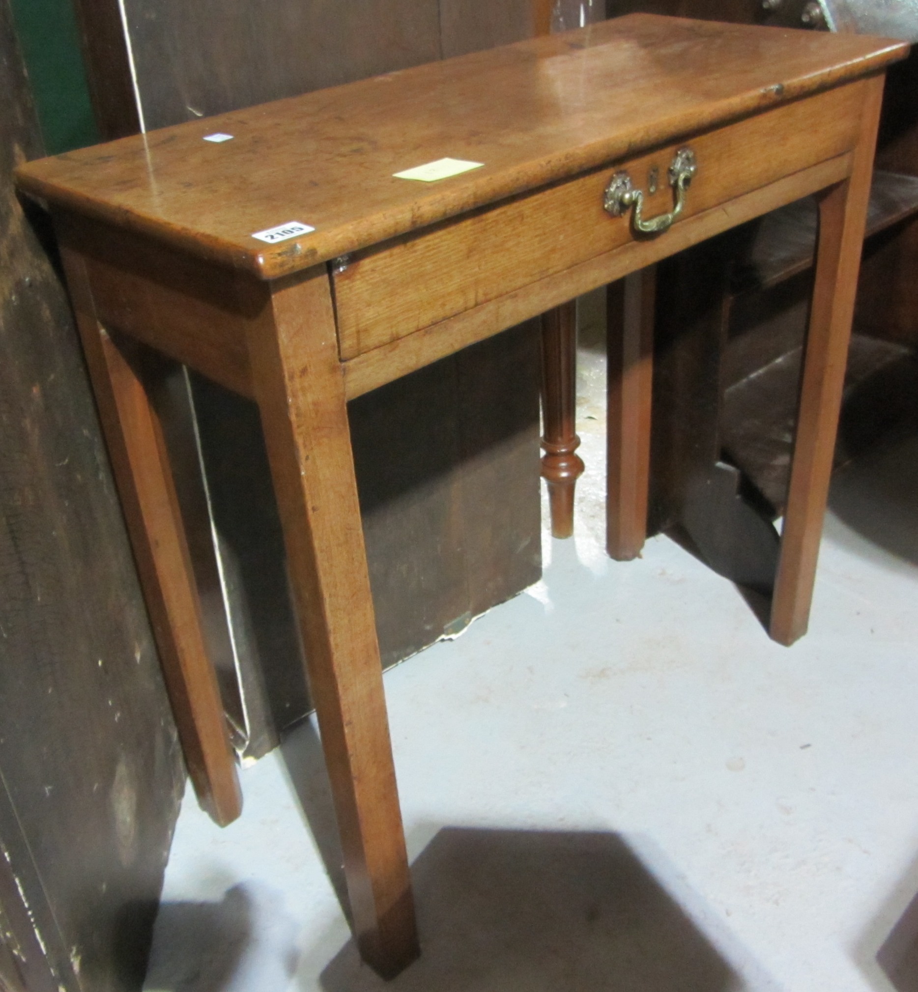 Appraisal: A th century mahogany single drawer side table