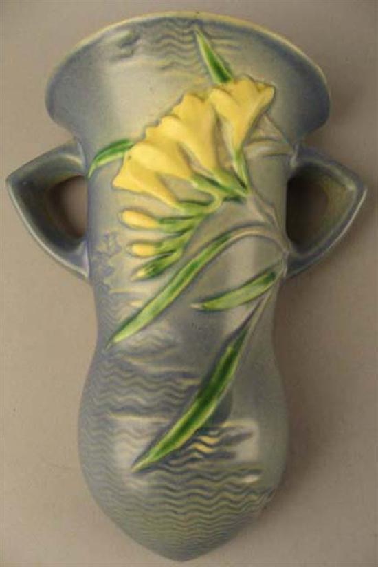 Appraisal: Roseville Pottery Blue Freesia Wallpocket shape - Embossed Roseville U