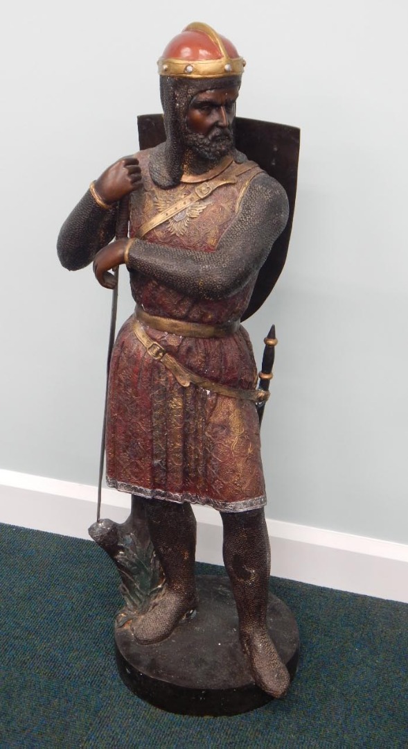 Appraisal: A thC cold painted bronze figure of a soldier wearing