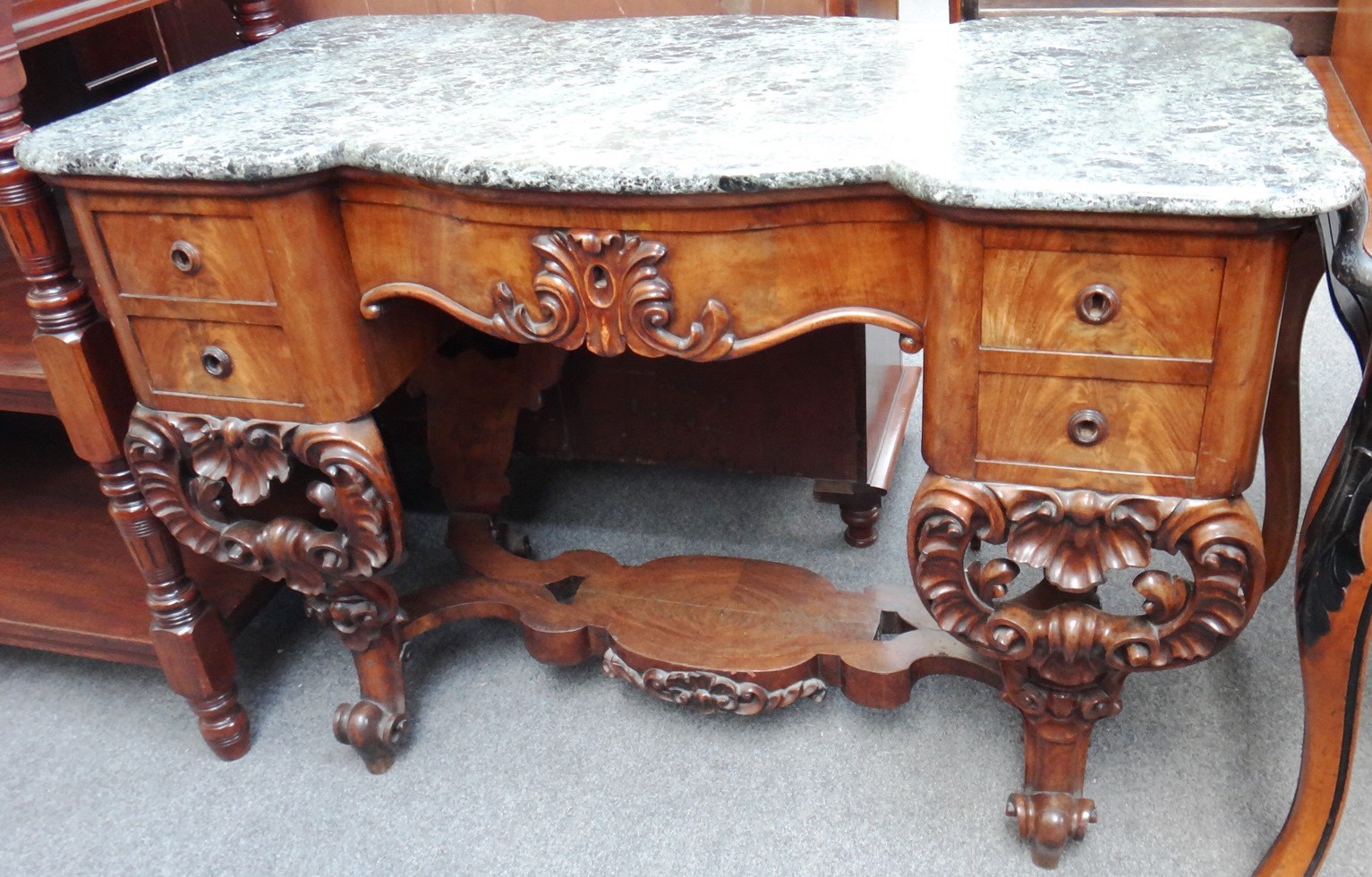 Appraisal: A th century freestanding dressing table the shaped marble top