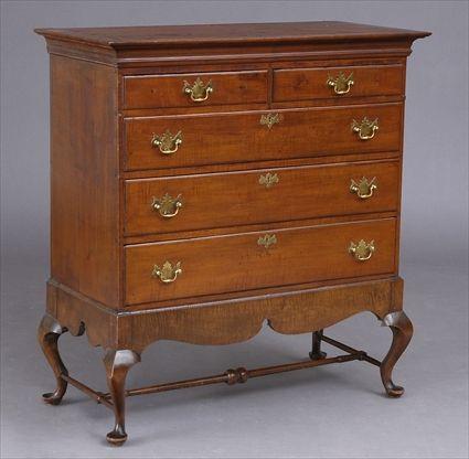 Appraisal: QUEEN ANNE MAPLE CHEST ON LATER FRAME The molded overhang