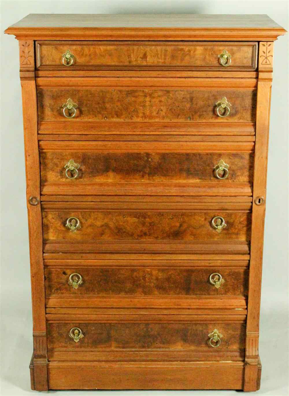 Appraisal: VICTORIAN AESTHETIC MOVEMENT WALNUT WELLINGTON CHEST having a rectangular top