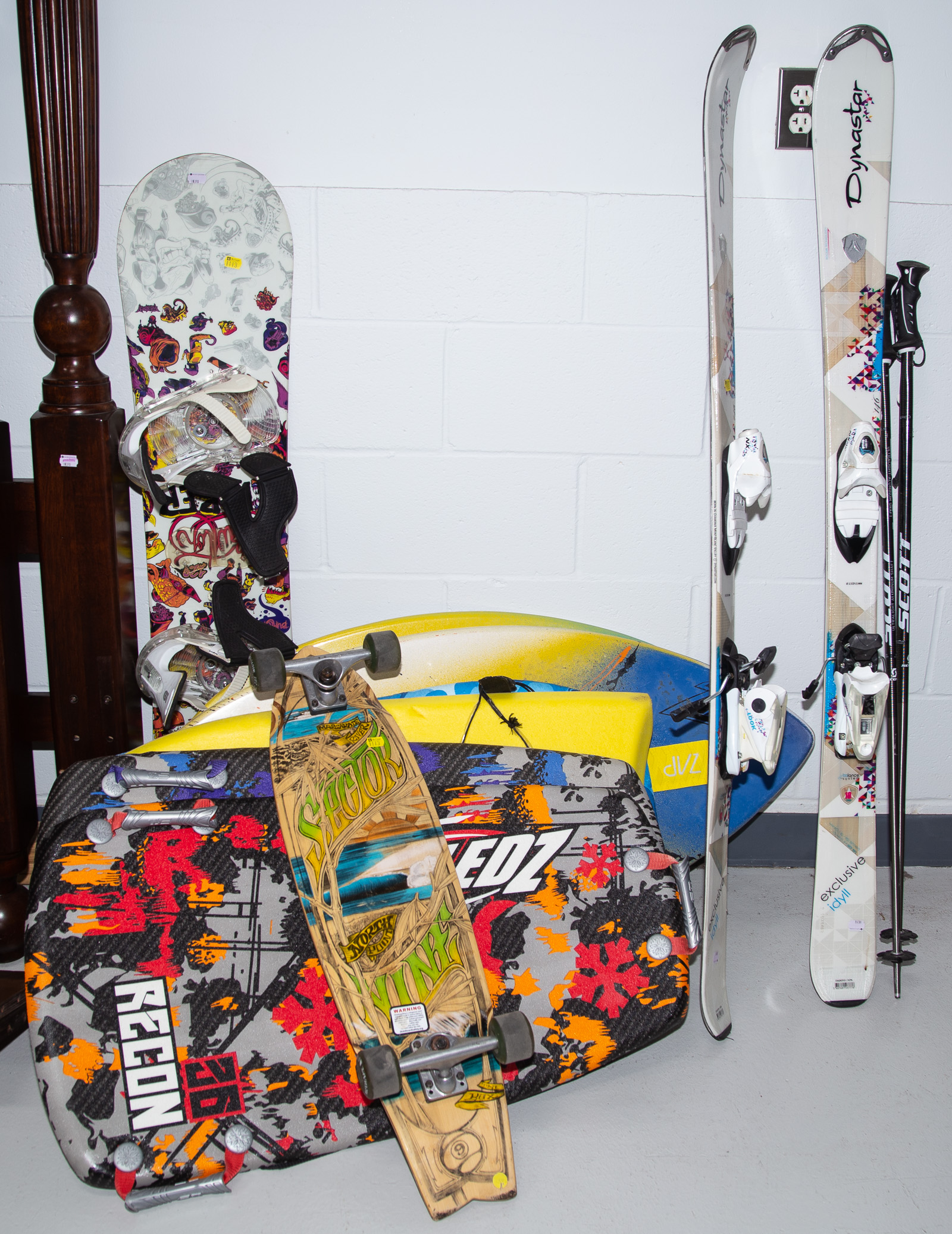 Appraisal: ASSORTED SPORTS ITEMS Including boogie boards skateboard Dynastar skis with