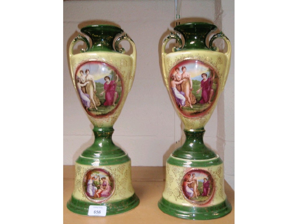 Appraisal: A pair of two-handled vases on stands cm high