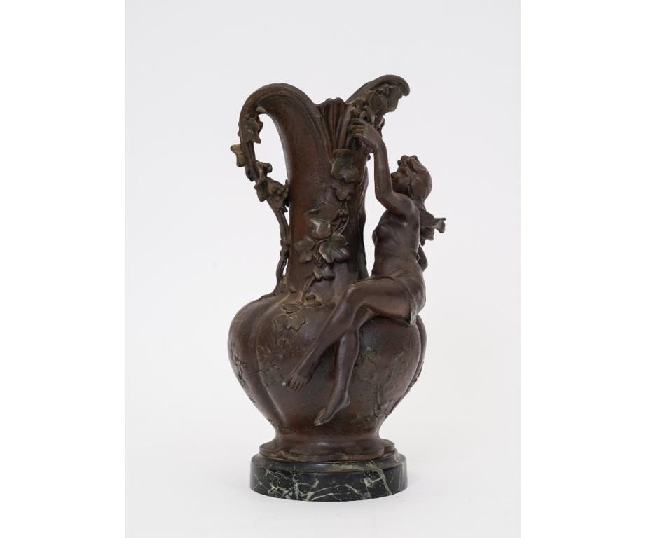 Appraisal: Art Nouveau spelter metal wine ewer circa with Bacchus mask