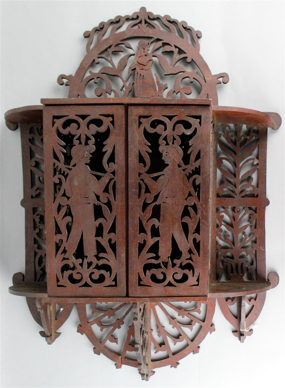 Appraisal: VICTORIAN STYLE CARVED AND PIERCED WOOD HANGING CABINET with arched