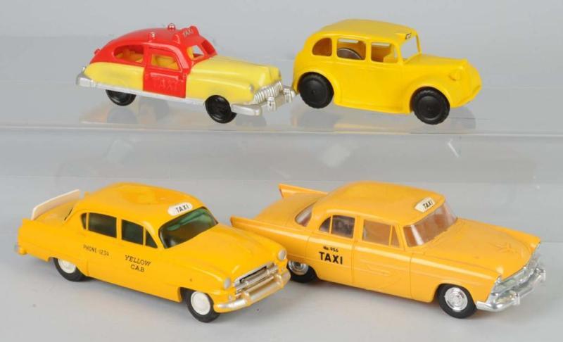 Appraisal: Lot of Plastic Taxi Cab Toys Description English and American