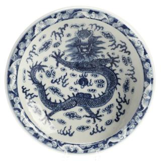 Appraisal: Chinese blue and white porcelain dragon dish Chinese blue and