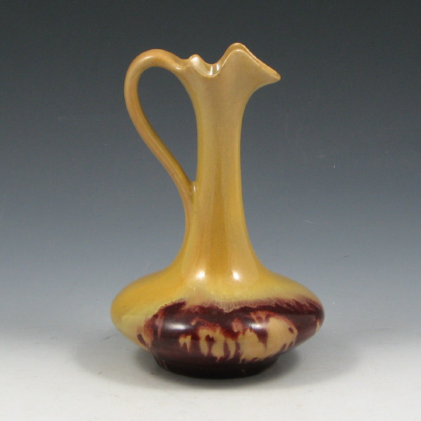 Appraisal: Arc En Ciel flambe ewer in yellow and red Marked