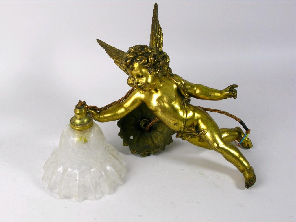 Appraisal: A late th Century gilt brass cherub hanging Light with