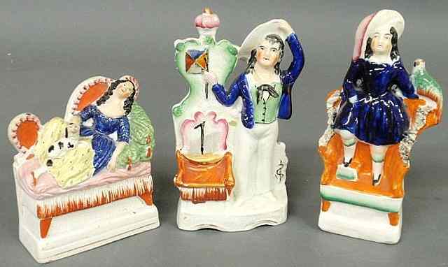 Appraisal: Three th c Staffordshire figural groups tallest h