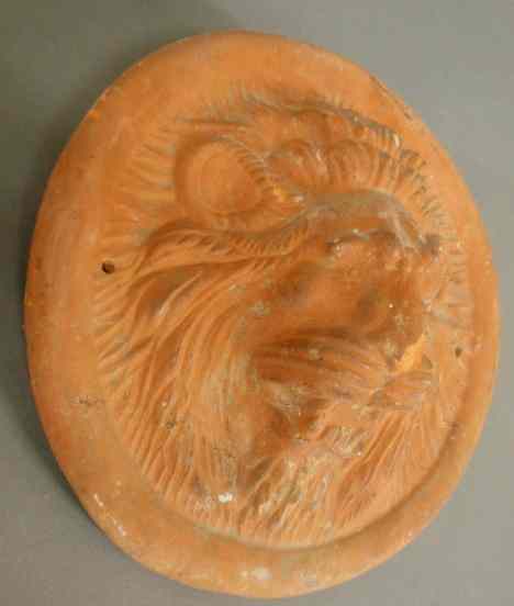 Appraisal: Terracotta lion head mask th c as found dia