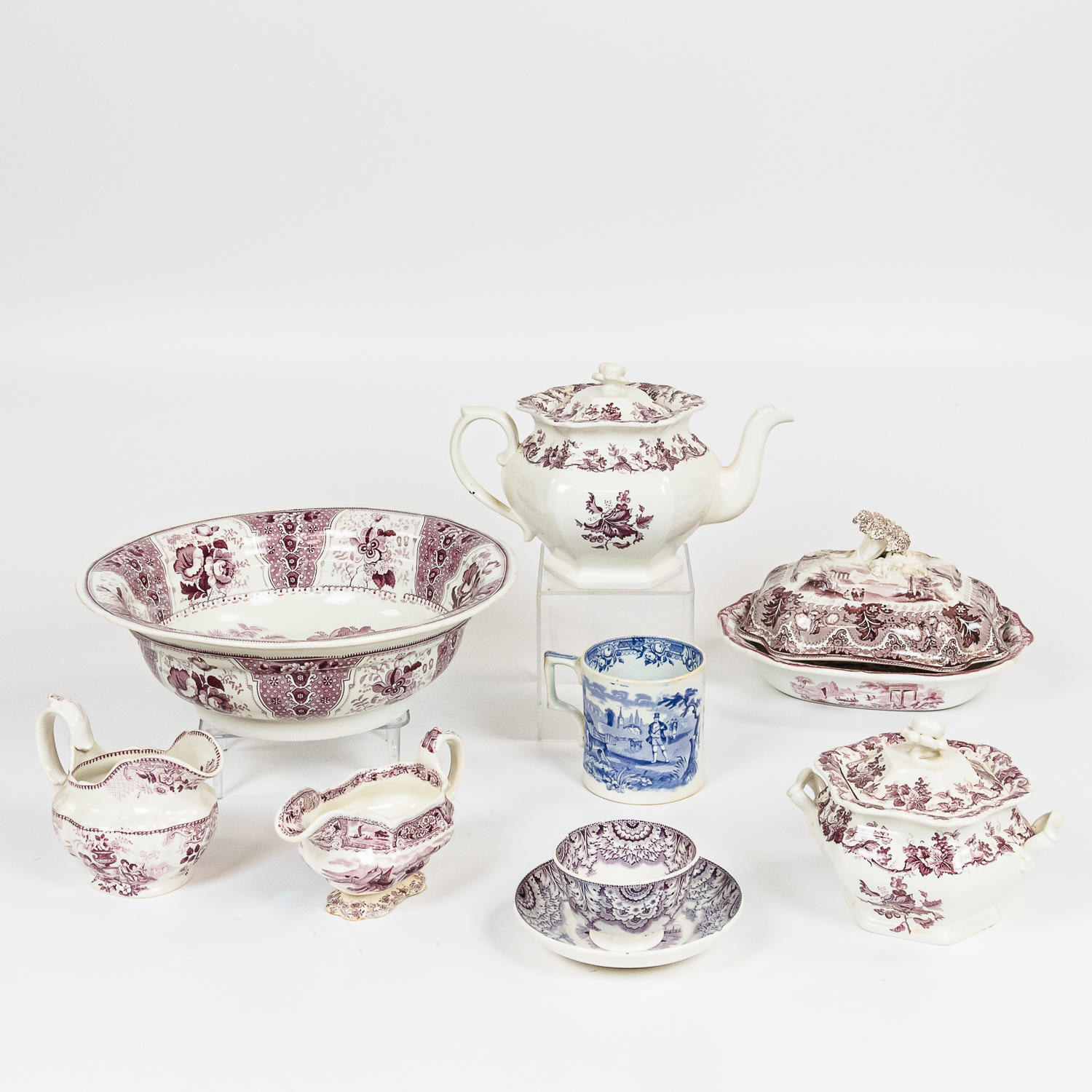 Appraisal: TEN PIECES OF PURPLE TRANSFER-DECORATED IRONSTONE TABLEWARE two creamers a