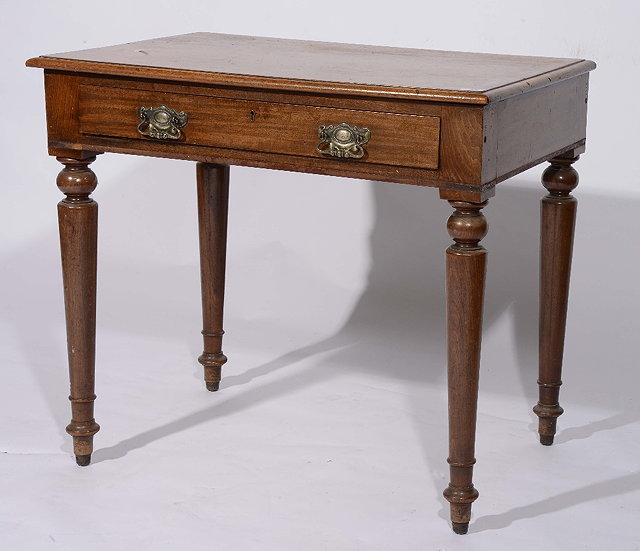 Appraisal: A Victorian mahogany side tablefitted one drawer on turned legs