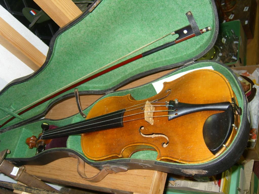 Appraisal: A cased violin and bow