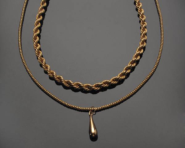 Appraisal: A collection of two gold necklaces featuring one k gold