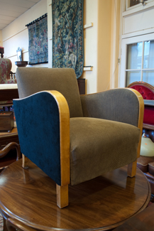 Appraisal: DECO STYLE BROWN AND BLACK ARMCHAIR