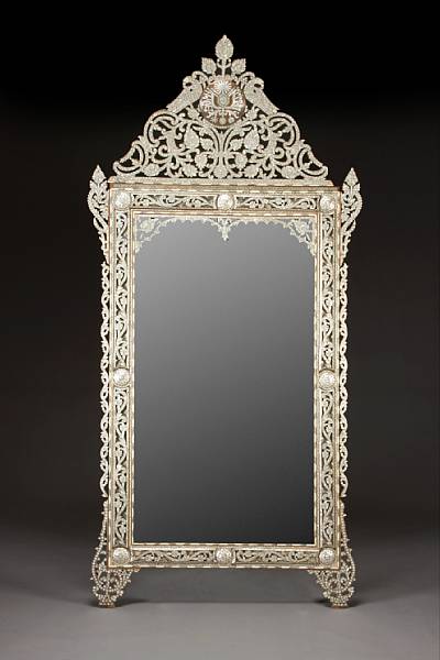 Appraisal: A Levantine shell inlaid hardwood mirror The arched plate within