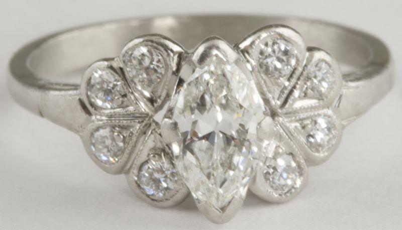 Appraisal: Platinum and Diamond Deco Style Engagement Ring centering on marquise