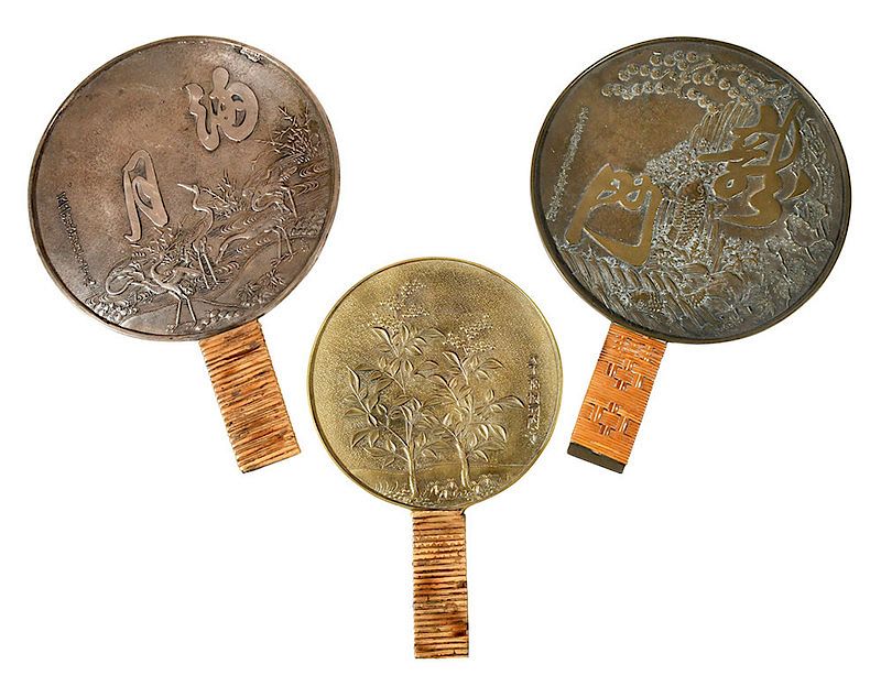 Appraisal: Three Asian Brass Repouss Hand Mirrors th th century three