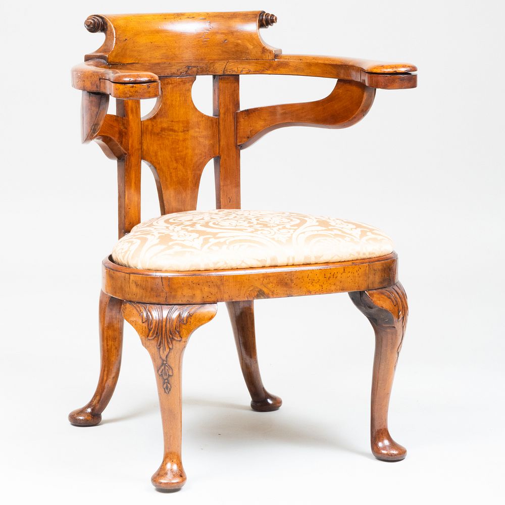 Appraisal: George II Walnut Reading Armchair The armrests opening to fitted