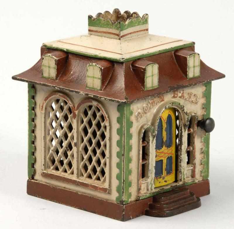 Appraisal: Cast Iron Home Mechanical Bank with Dormers Description Patented Manufactured