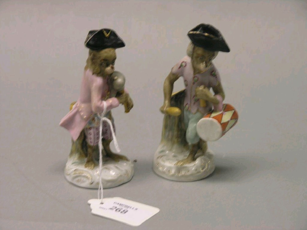 Appraisal: A pair of Volkstedt porcelain monkey bandsmen one playing the