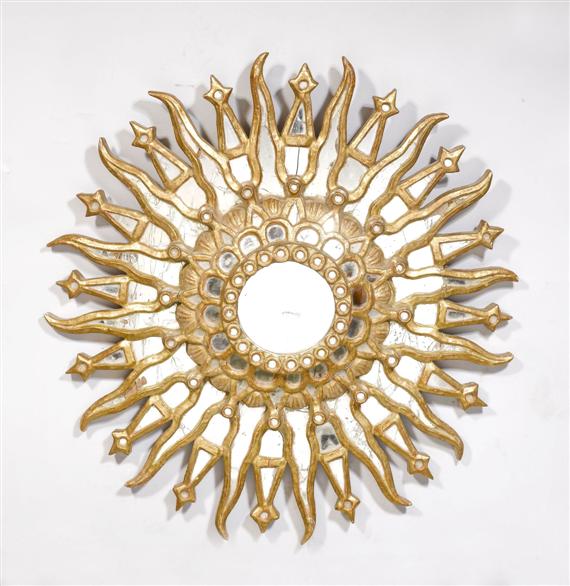 Appraisal: AN IRRADIANT SUN MIRROR in Gothic Revival style th c