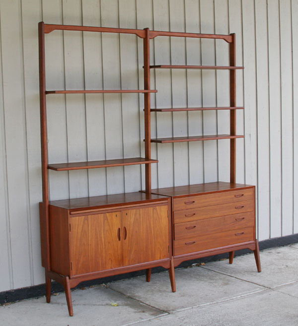 Appraisal: Danish modern shelving storage wall unit adjustable shelving above two