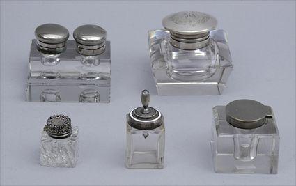 Appraisal: GROUP OF FIVE GLASS INKWELLS The largest with tapered sides