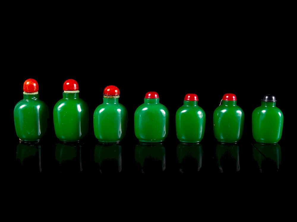 Appraisal: Seven Chinese Green Glass Snuff Bottles Tallest height in cm