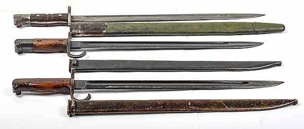 Appraisal: US WWII Bayonets Lot of Three Lot includes one P-